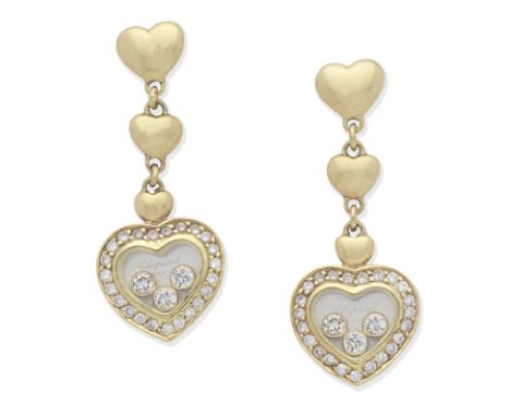 CHOPARD: 'HAPPY DIAMONDS' EARRINGS Each heart-shaped pendant, set with brilliant-cut diamonds, the glazed compartment reveali