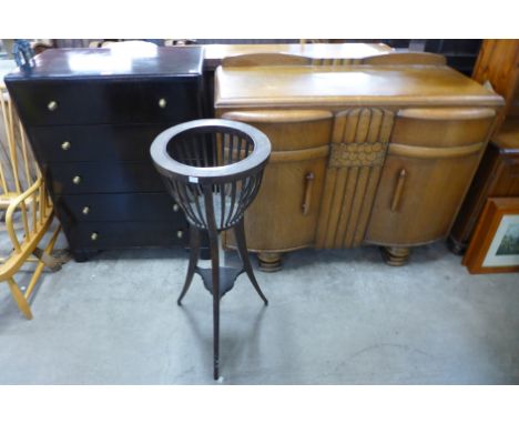 An Art Deco oak sideboard, chest of drawers and a mahogany jardiniere