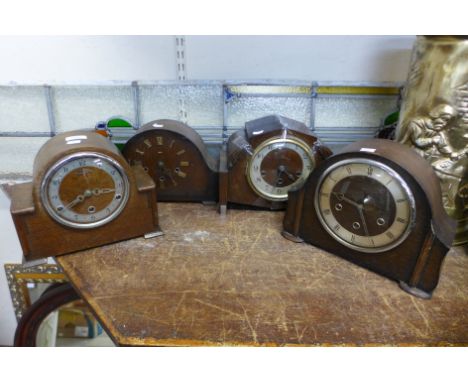 Four Art Deco oak clocks