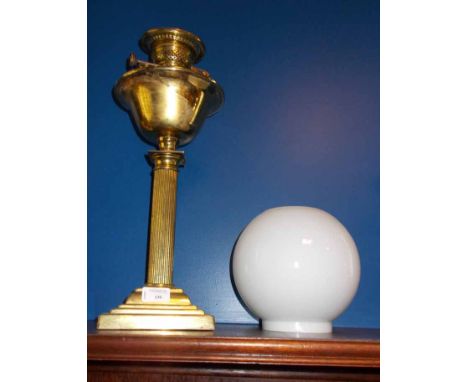 CORINTHIAN COLUMN BRASS OIL LAMP together with glass shade