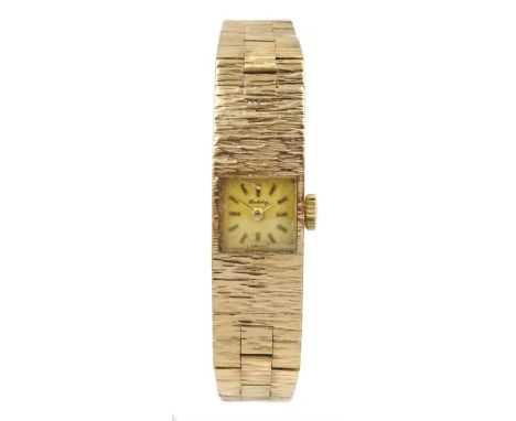 Berkeley 9ct gold ladies manual wind wristwatch, on 9ct gold bark effect bracelet, hallmarkedCondition Report:Approx 20gm (ex