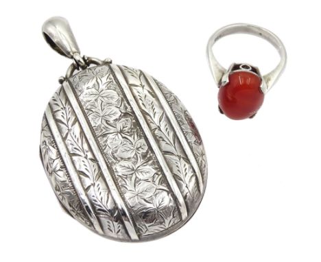 Victorian silver locket with bright cut floral decoration and a Scottish silver cabochon agate ring, hallmarkedCondition Repo