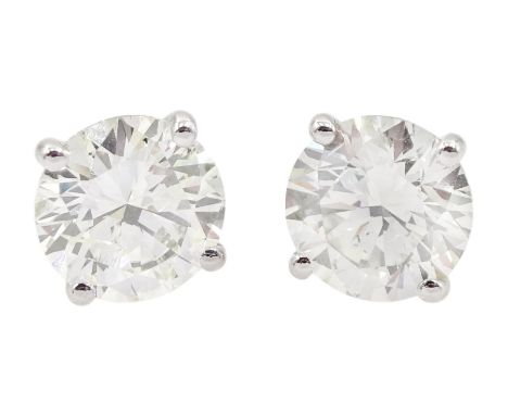 Pair of 18ct white gold round brilliant cut diamond stud earrings, hallmarked, total diamond weight approx 2.00 caratConditio