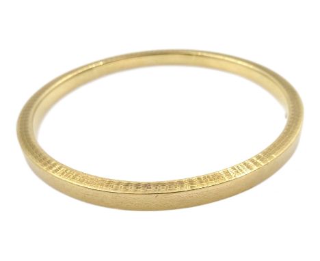 Early 20th century large 9ct gold bangle with engine turned decoration, makers mark M&amp;M, Birmingham 1928Condition Report: