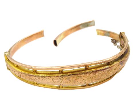 Early 20th century 9ct rose gold hollow bangle with engraved decoration, Chester 1912Condition Report:Approx 7.3gm, bangle in
