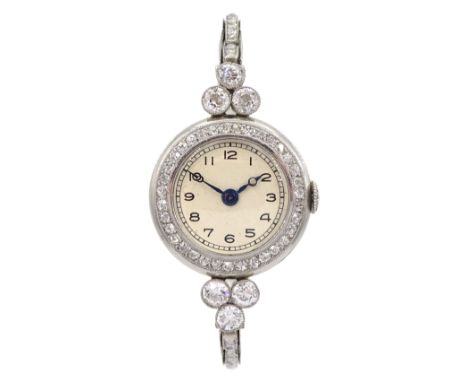 Platinum Art Deco milgrain set diamond manual wind lever wristwatch, cream enamel dial with Arabic numerals, diamond set beze
