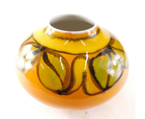 A 20thC Poole pottery Delphis style vase, floral leaf pattern on yellow and orange ground, marked AF 32 beneath, 14cm high.