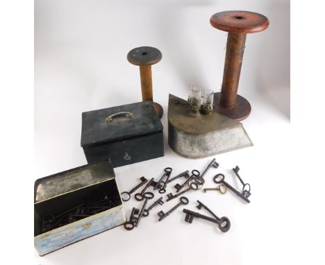 A collection of items, to include a Trustee alarm box, with a key, two large industrial spindles or reels, vintage keys, and 