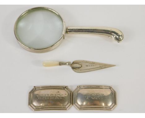 An Edward VII silver and mother of pearl trowel bookmark, Birmingham 1908, 8cm wide, a silver handled magnifying glass and a 