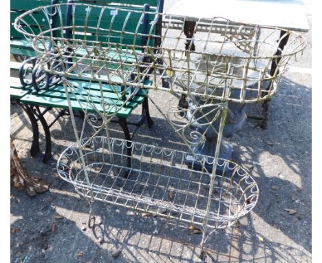 A Victorian wirework two sectional garden planter, of oblong form, on turned legs terminating in scroll feet, 85cm high, 82cm