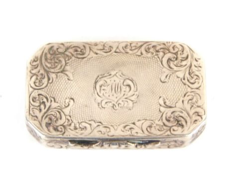 An early 19thC silver vinaigrette, of canted rectangular form, part engine turned and initialled with thumb mould handle and 