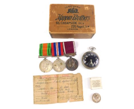 Various WWII medals, military button, etc., a Good Conduct medal with Regular Army clasp, WWII Campaign and Victory medals, a