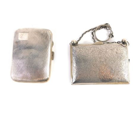 An Edward VII silver evening purse, by William M Hayes, of rectangular form, with chased scroll decoration, chain handle and 