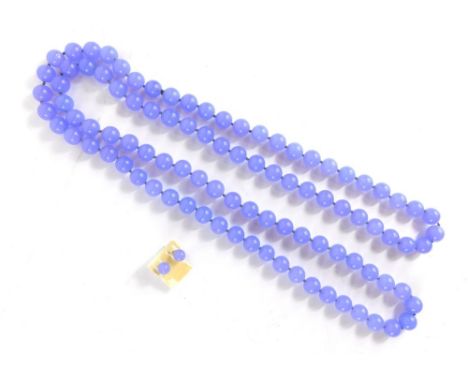 A lilac jade bead necklace, with lace and earring fitments, each bead approximately 1cm diameter.