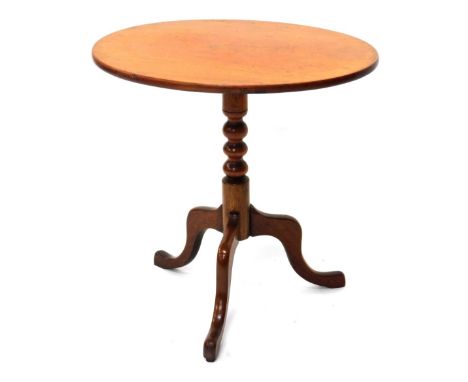 A 19thC mahogany occasional table, the oval tilt top on a bobbin turned column and tripod base, 54cm wide.