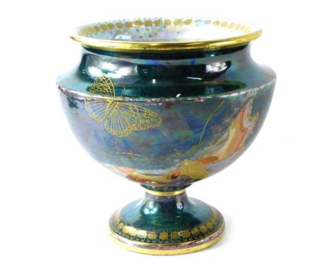 A 20thC Carltonware Armand bowl, decorated with butterflies on a circular foot, with fish back stamp number 21005, 16cm high.