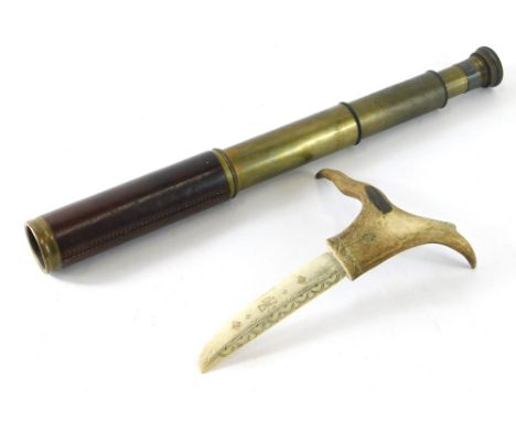 A Scandinavian hunting knife, carved from a section of an antler and a three drawer telescope, with leather section.  