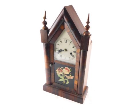 A 19thC New Haven American mantel clock, in yellow case, with 18cm diameter back plate with Roman numeric dial and glazed fro