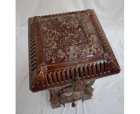 An Art Nouveau Deville & Cie, Charleville, cast iron Monopole stove, model 116. with a ceramic top and sides cast with flower