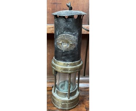 A Cambrian Collieries Clydach Vale steel and brass miners lamp, 