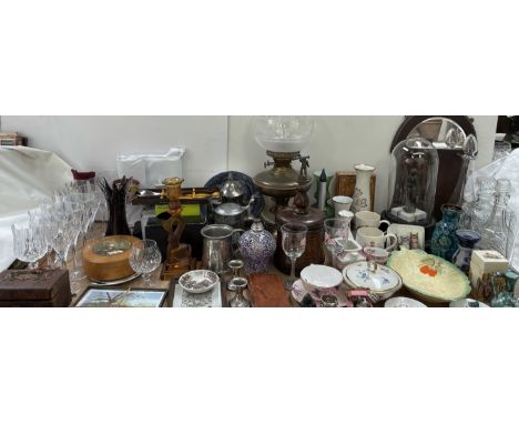 A brass oil lamp, together with a figure under a dome, glass decanters, pewter mug, drinking glasses, etc