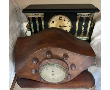 A cut down Aeroplane propeller mounted with a clock with a silvered dial and Arabic numerals together with a faux black slate