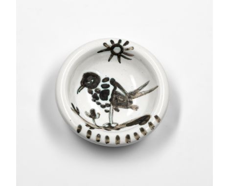Pablo Picasso (Spanish, 1881-1973)Oiseau au Soleil (Ramié  174) White earthenware ceramic ashtray with black oxide and white 
