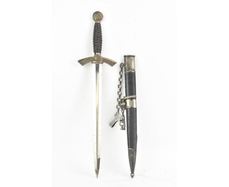 A German WWII Luftwaffe 1st pattern parade dagger, having a Swastika globe pommel, wire wrapped celluloid handle, white metal