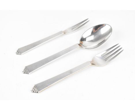 An Art Deco Georg Jensen Danish sterling silver fork, spoon and pickle fork, the fork and spoon having import marks for Londo