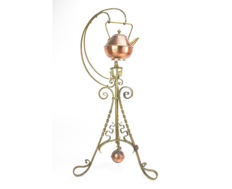 A late 19th century Aesthetic Movement Benham & Froud copper spirit kettle, designed by Dr Christopher Dresser, suspended by 