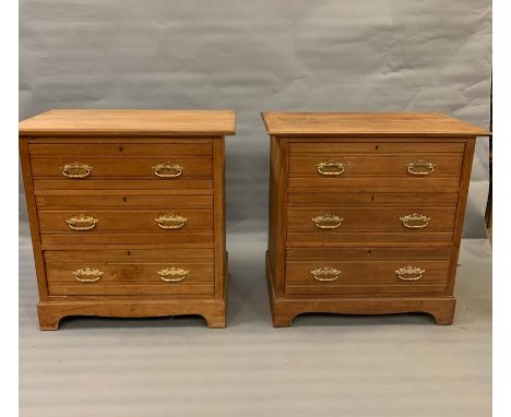 A pair of pine chest of three drawers on bracket feet (H84cm W84cm D50cm)