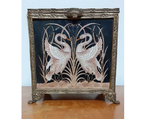 A ceramic and brass box with swans, with "Wong Lee" company mark, (21x20x14 cm).