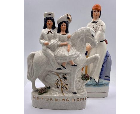 A pair of vintage Staffordshire pottery (style) figures, compromising of "Returning home" and a cricket player (24 cm tallest