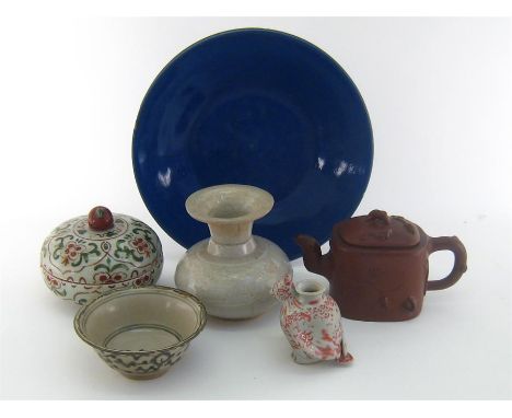 Six items of Chinese ceramics comprising a dark blue Q’ing dynasty open bowl, a Yi-Xing teapot, a covered bowl, an open bowl,