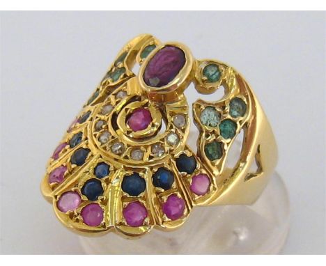 An 18 carat gold and multi-gem peacock ring, set overall with ruby, sapphire, emerald, diamond and garnet, the shank stamped 