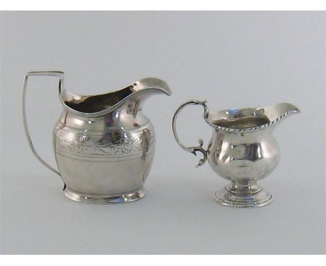 A George III oval silver cream jug, maker’s mark partially rubbed, probably by Alexander Field, London, 1800, engraved floral