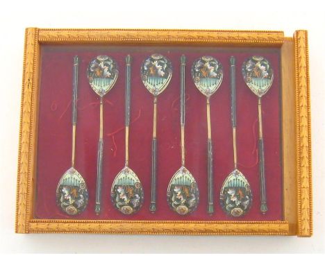 A set of 8 Russian silver-gilt and shaded cloisonne enamel spoons by the 6th Moscow Artel, 1908/17 and also later struck with