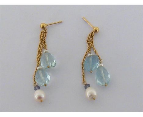 A pair of aquamarine, cultured pearl and amethyst drop earrings, each composed of three fine link drops terminating respectiv