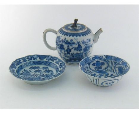 Three Chinese blue and white ceramics comprising a teapot with dog of Fo finial and fishing scenes, 18th. century, a bowl wit
