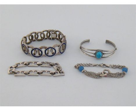 A mixed lot of white metal (tests silver) bracelets, including two Italian examples, stamped 925’; an enamel set example, sta