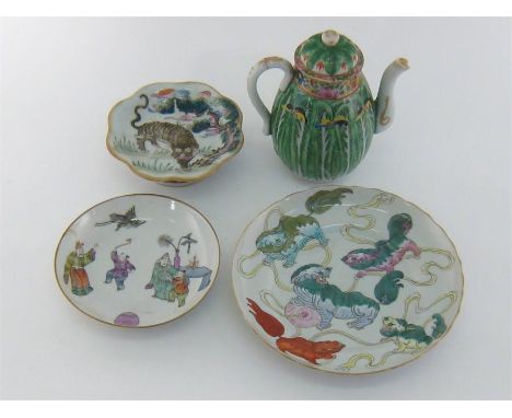 Four items of Chinese ceramics comprising a famille rose plate featuring  lion dogs at play, Dao-Guang mark and period, 19cm.
