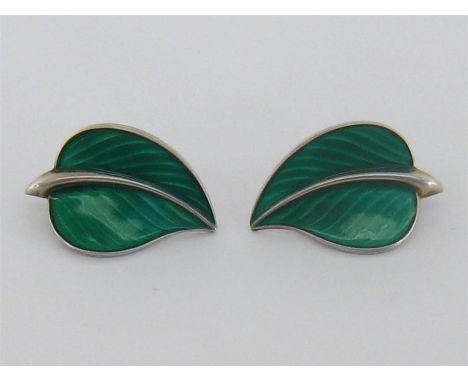 A pair of 1940s Norwegian silver and enamel ear clips by Bernard Meldahl, designed as green guilloche enamel leaves, 3cm long