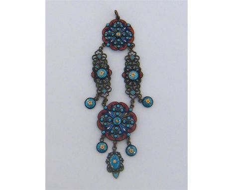 A 19th century Austro-Hungarian polychrome enamel pendant, composed of two principal quatrefoil motifs, with scrolling open w