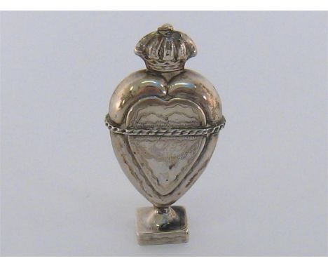 A Norwegian silver heart-shaped hovedvandsoeg by Andreas Christian Mogelvang, Bergen, 1851, with crown finial and gilt interi