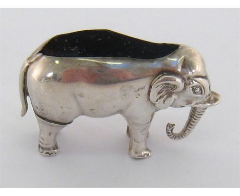 An Edwardian silver elephant pin cushion (cushion missing) by Cornelius Saunders and Francis Shepherd, Birmingham, 1905.  Con