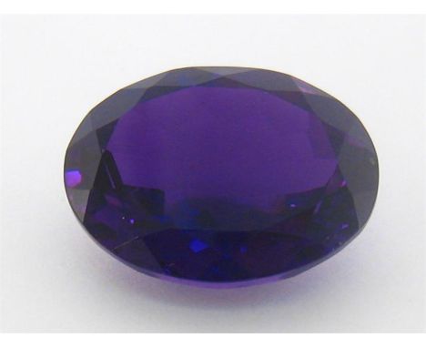 A loose oval cut amethyst, 19.7 x 15.1 x 8.8mm, 3.4gms. VAT will be added to the hammer price.
