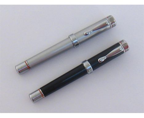 Harley Davidson, two fountain pens, a black example and a silver example, both cartridge fillers, no box or paperwork
