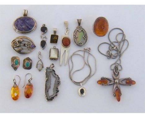 A mixed lot of silver and gem set jewellery, including an African motif and amber pendant, Birmingham 1994, on a chain; a geo