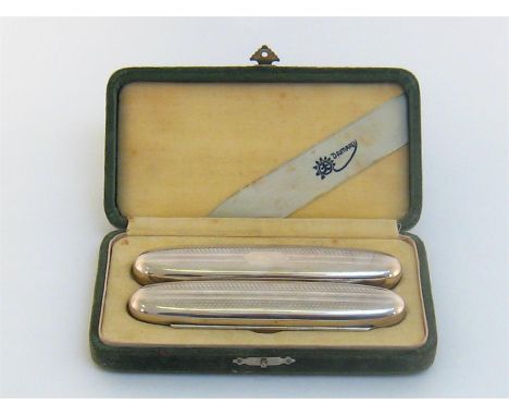 A good Japanese silver double cheroot case, with Japanese character mark, probably early 20th century, in original green velv