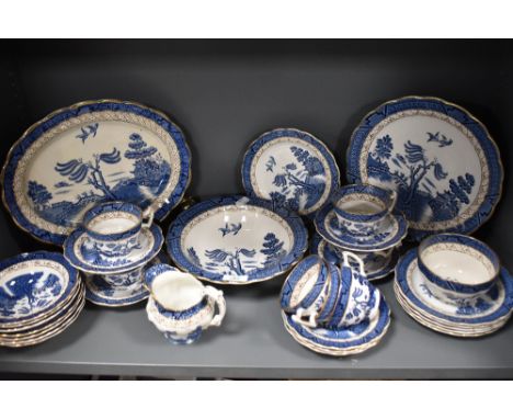 A vintage Booths Real Old Willow pattern part tea and dinner service.